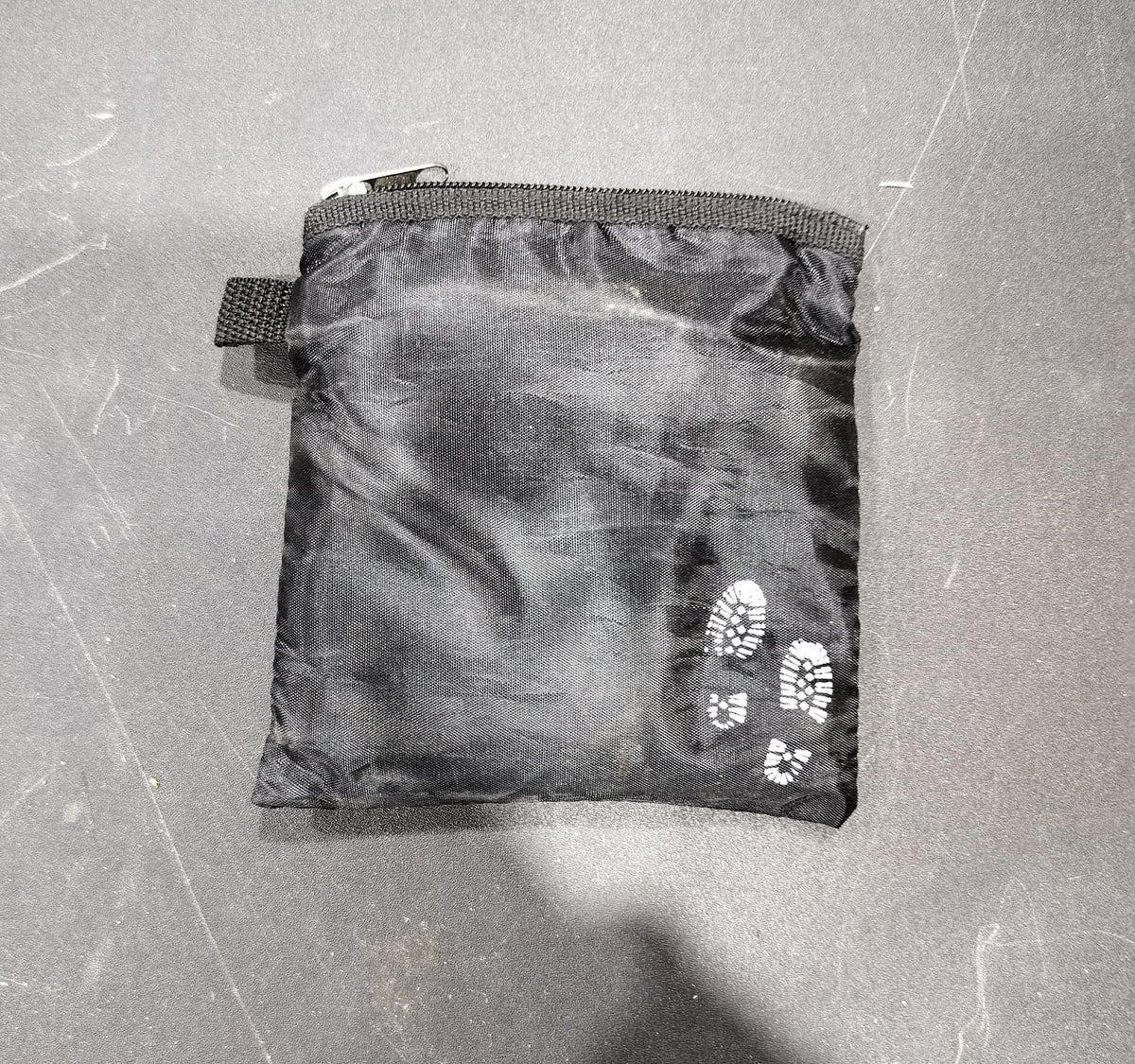Drawstring bag in a pouch