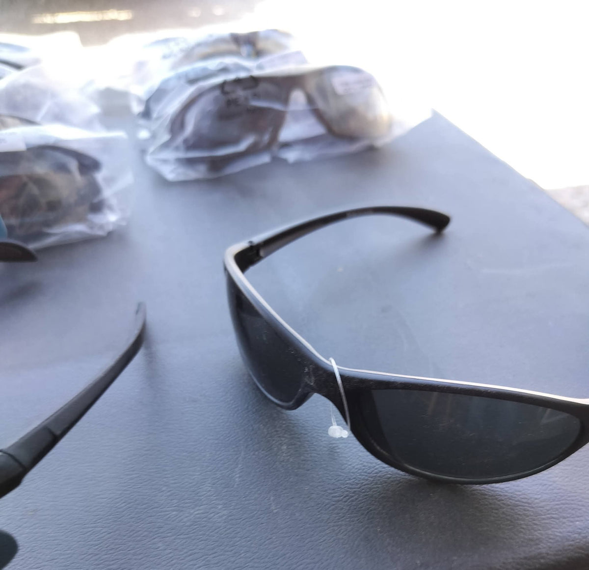 Sunglasses black lenses black plastic frame