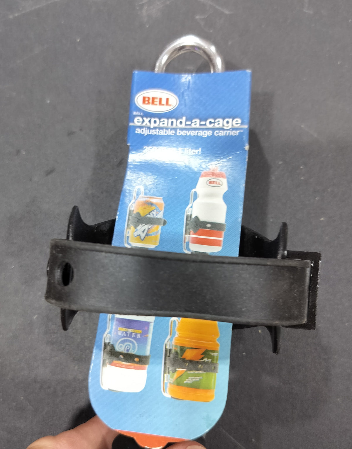 Expanding cage bicycle drink holder