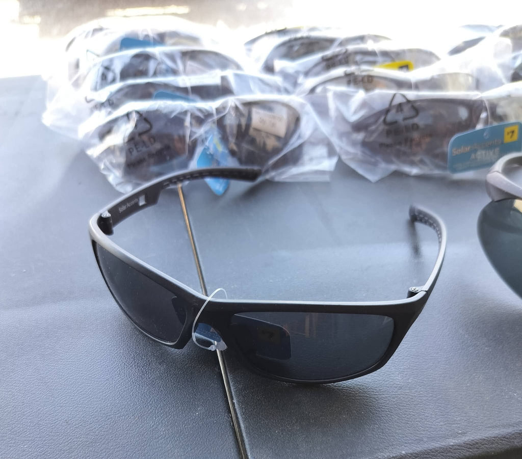 Sunglasses black lenses black plastic frame
