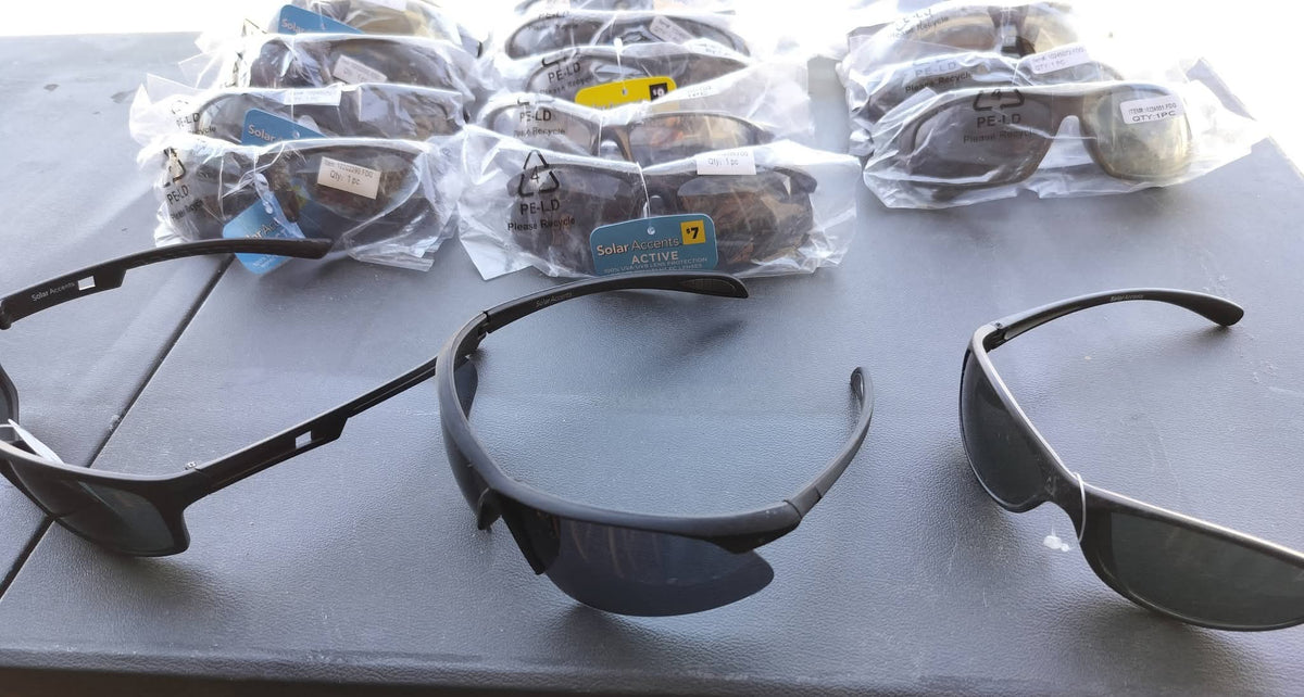 Sunglasses black lenses black plastic frame