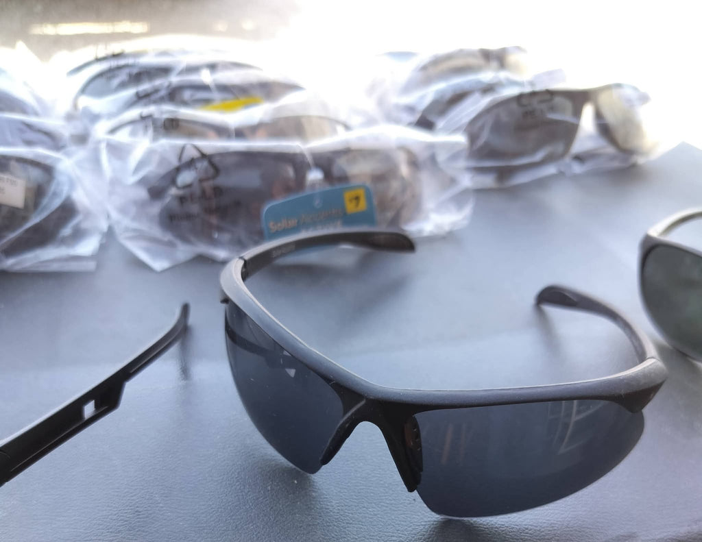 Sunglasses black lenses black plastic frame