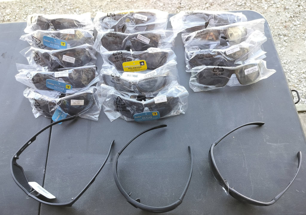 Sunglasses black lenses black plastic frame