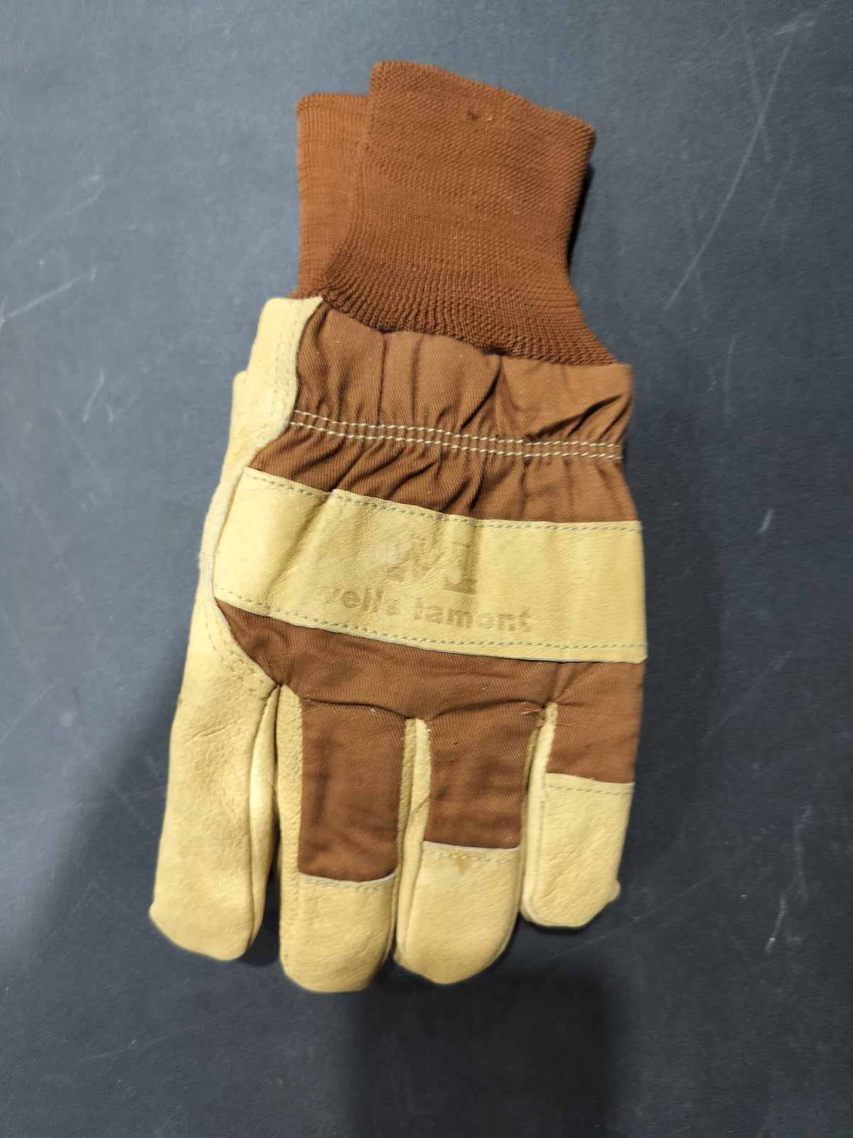 Tan and brown leather gloves